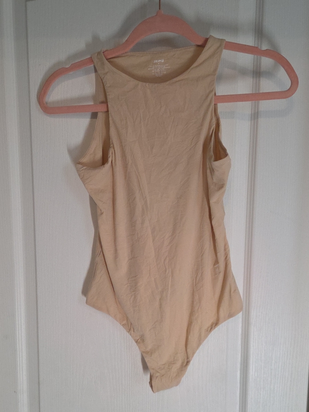 SKIMS Tan Sleeveless One-Piece Bodysuit